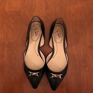 Black pointed toe flats with buckle